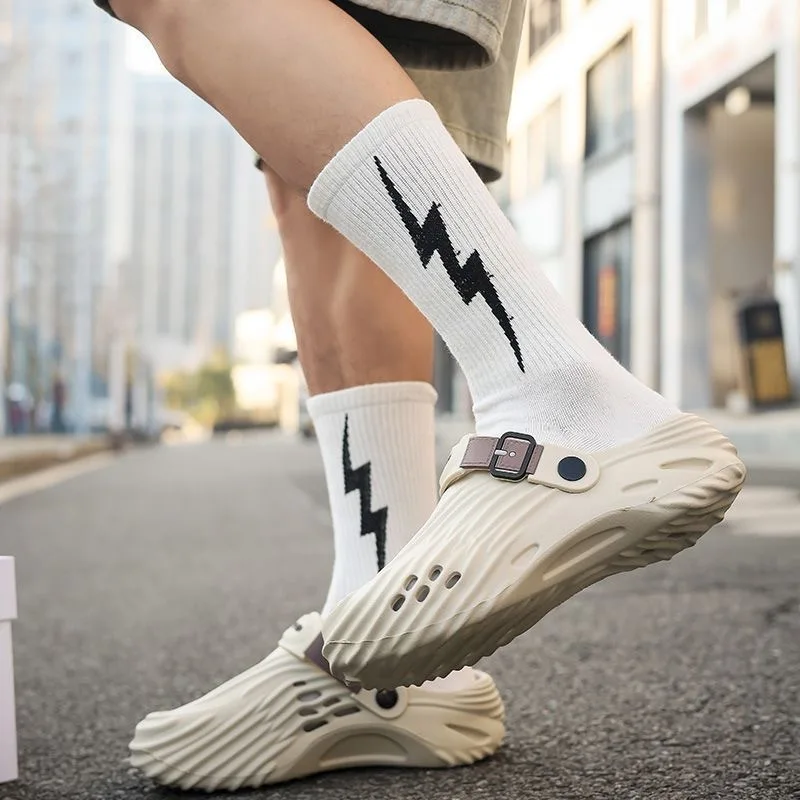 

Black trend hole shoes men's outdoor creek shoes wear beach shoes one-word slippers men's bag head drag casual sandals