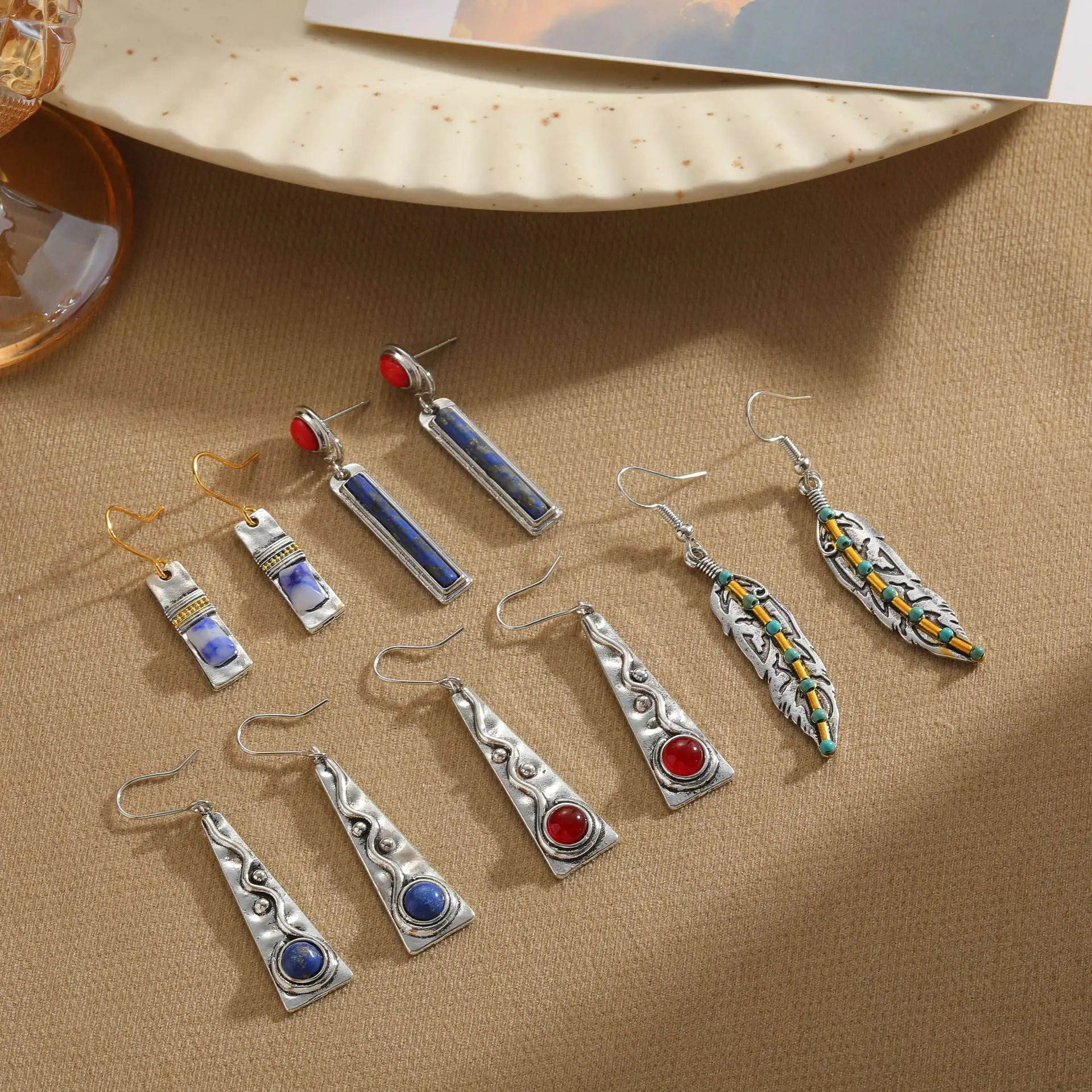 Hot selling alloy, natural stone, oil drop jewelry, earrings, artistic and retro design, niche, and wholesale of earrings