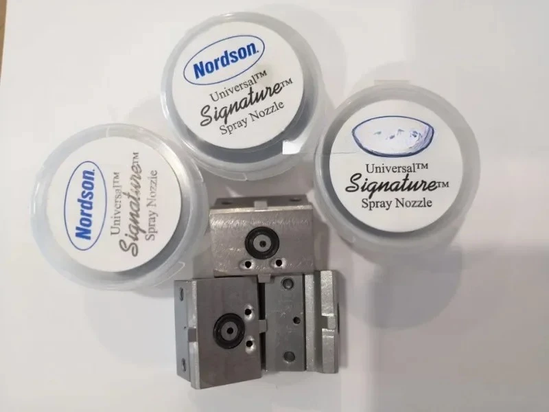 

Original Nordson hot melt adhesive nozzle NOZZLE 1095241 from the United States