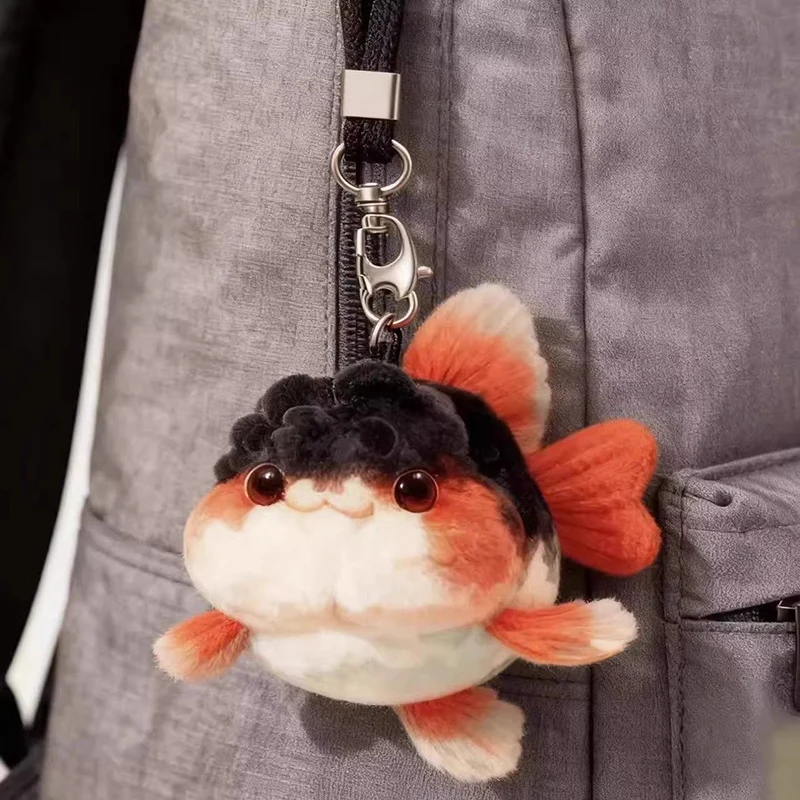 Pluszowa zabawka mała złota rybka o wysokiej estetyce, urocza pluszowa rybka jako zawieszka do torby lub breloczek, super urocza lalka.