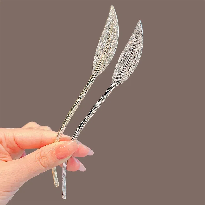 

Hot selling women's modern simple diamond inlaid leaf hairpin with antique style tassel and step rocking hair accessory