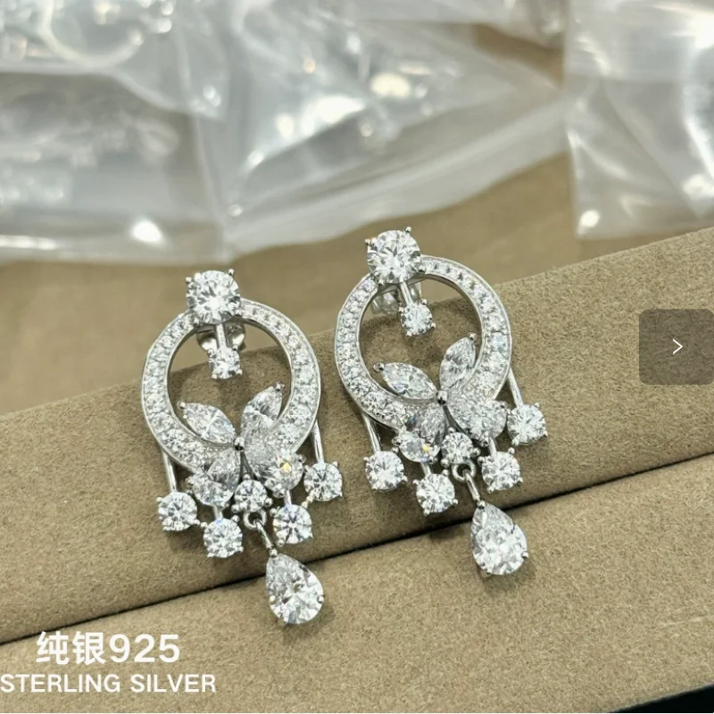 

Pure Silver S925 Garden Butterfly Water Drop Necklace and Earrings Set – A Sophisticated and Luxurious Elegant Design