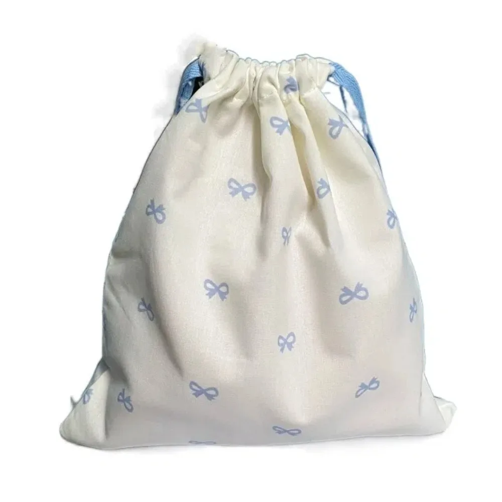 

Diaper Pouch Canvas Bundle Pocket Portable Large Drawstring Hanging Bag White Bow Printed Drawstring Storage Bag Work