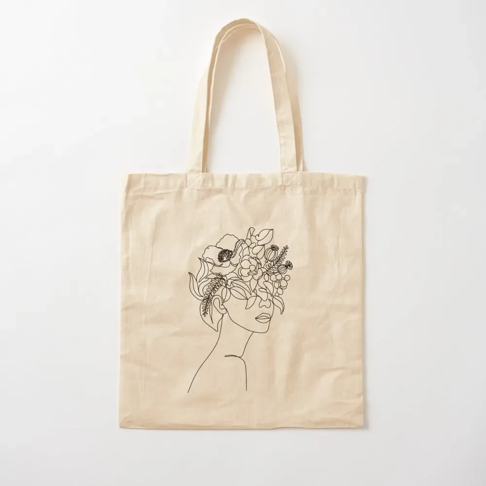 

Abstract face with flowers line art drawing. Portrait minimalistic style. Botanical print. Flower head. Tote Bag