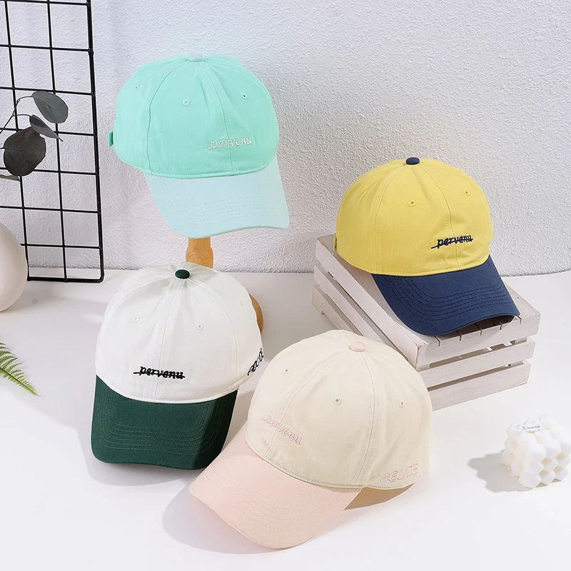 The new soft top Macaron color embroidered small letter copper buckle baseball cap fashion casual splice shade cap