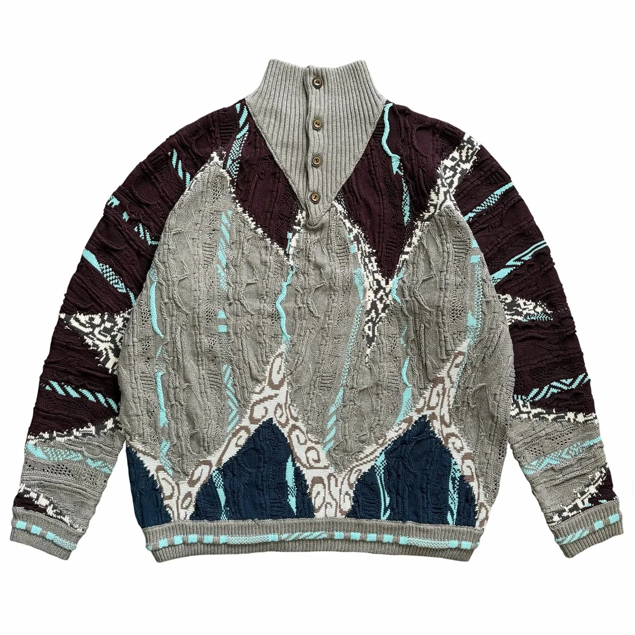 

Новинка: Мужской свитер в винтажном японском стиле с контрастными вставками, полувысоким воротником, текстурным пэчворком и жаккардовым узором.