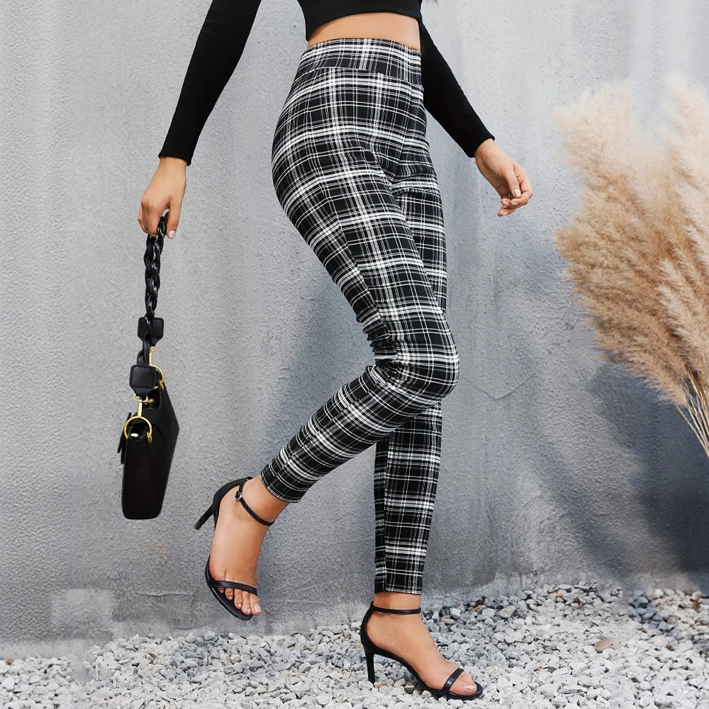 سراويل نسائية أوروبية وأمريكية عالية الخصر موضة ربيع الخريف سراويل ضيقة غير رسمية باللون الأسود والأبيض متعددة الاستخدامات