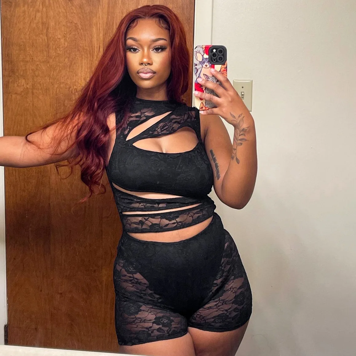 Red Waist-Trainer Bodysuit material texture close-up showing 180 GSM polyester-spandex blend