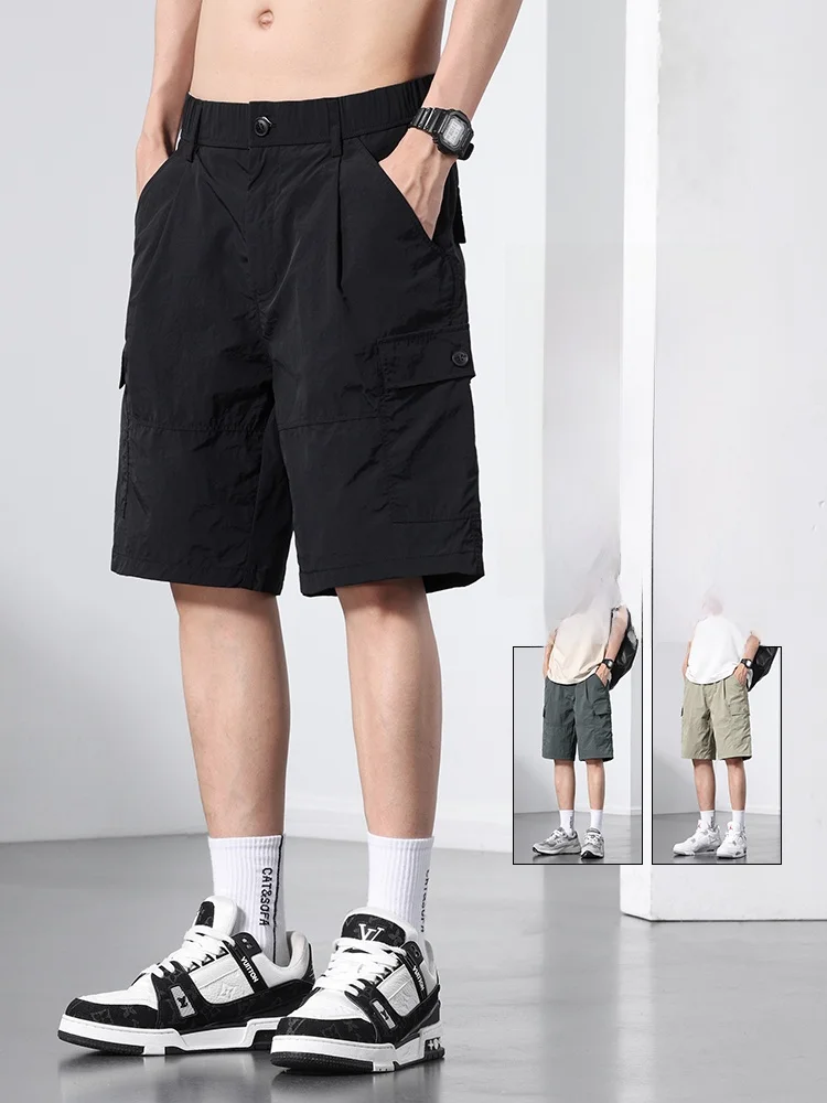 

Повседневные мужские летние тонкие универсальные спортивные брюки средней длины из ледяного шелка, модная свободная прямая рабочая одежда с пятью четверками...