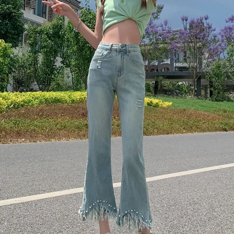 

Women Blue Flare Jeans Summer Trendy High Waist Beading Tassel Raw Edge Pants Chic Deisgn Ladies Denim Pants High Street