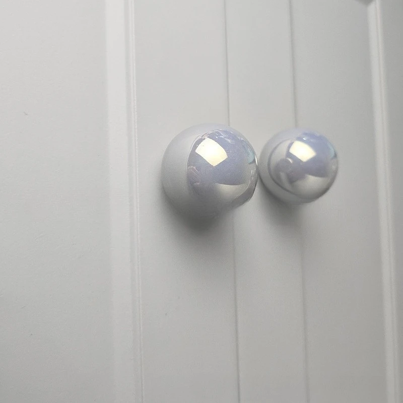 Ceramic pearlescent handle high-end furniture wardrobe drawer kitchen cabinet door round button shoe cabinet door small handle