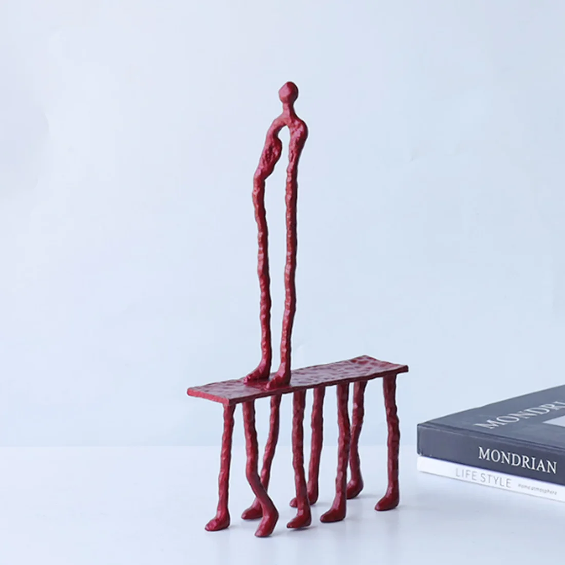 Retro creative cast iron blowing with the wind character ornament model house furniture store bookcase decoration furnishings