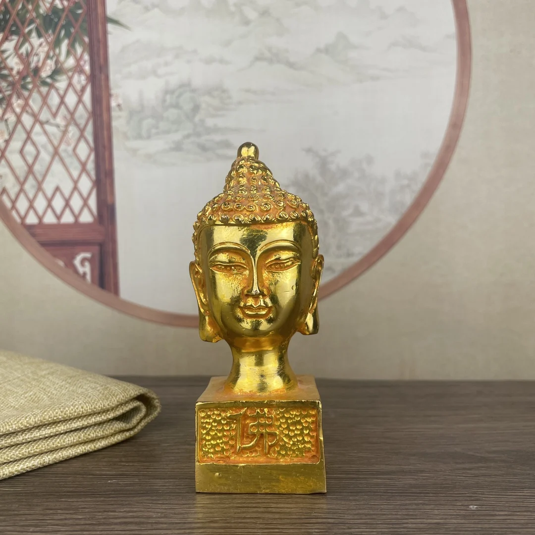 

Metal statues Gilded Buddha Light Illuminates Buddha Head Seal Approximately 5cm in length, 4cm in width, 11.8cm in height, and