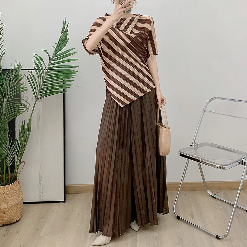 Miyake Pleated Irregular Stripe Top + Solid Color Loose Wide Leg Pants Two Piece Under Casual Peplum Women\'s Suit