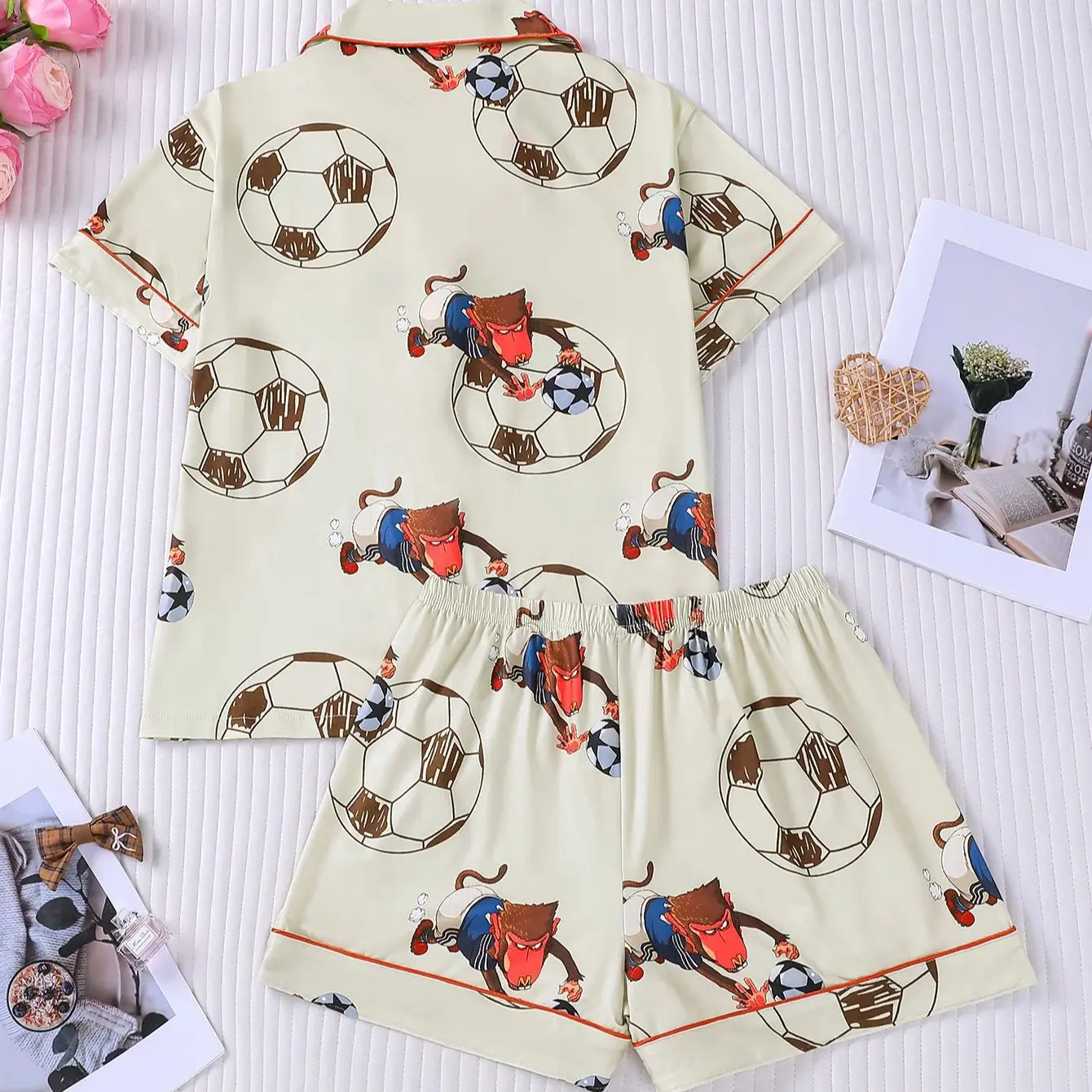 Rice white monkey soccer pajama set with contrasting orange edge collar design, short sleeved shorts, skin friendly home wear