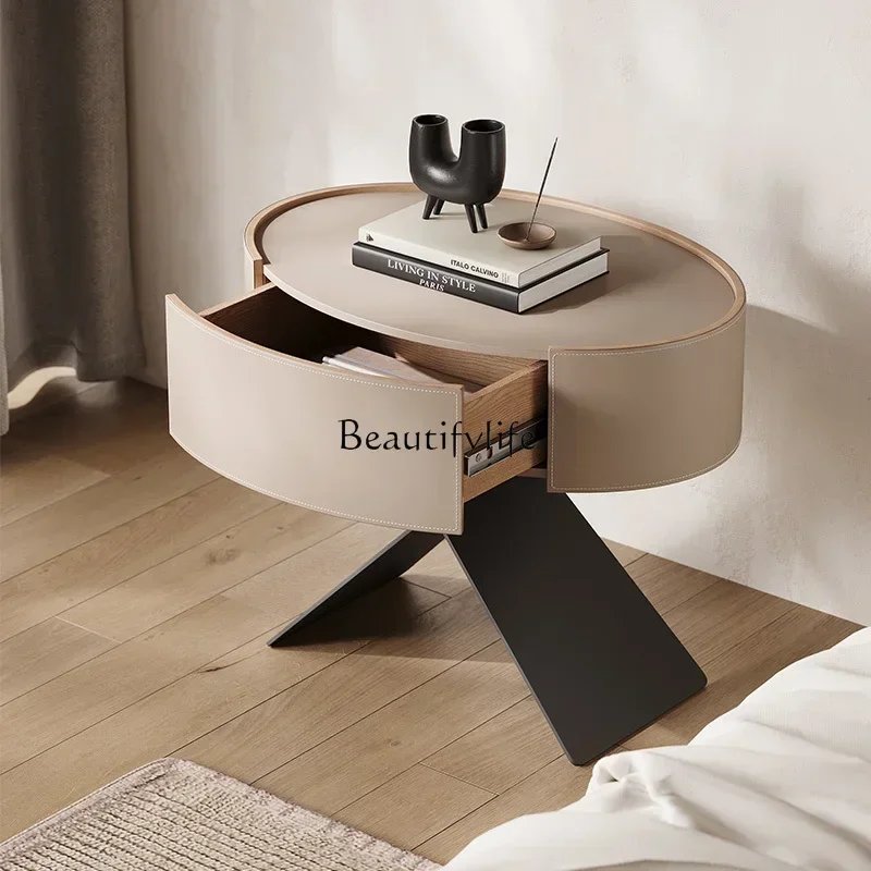 

88.Italian minimalist saddle leather bedside table designer metal cross Italian minimalist Nordic minimalist bedside