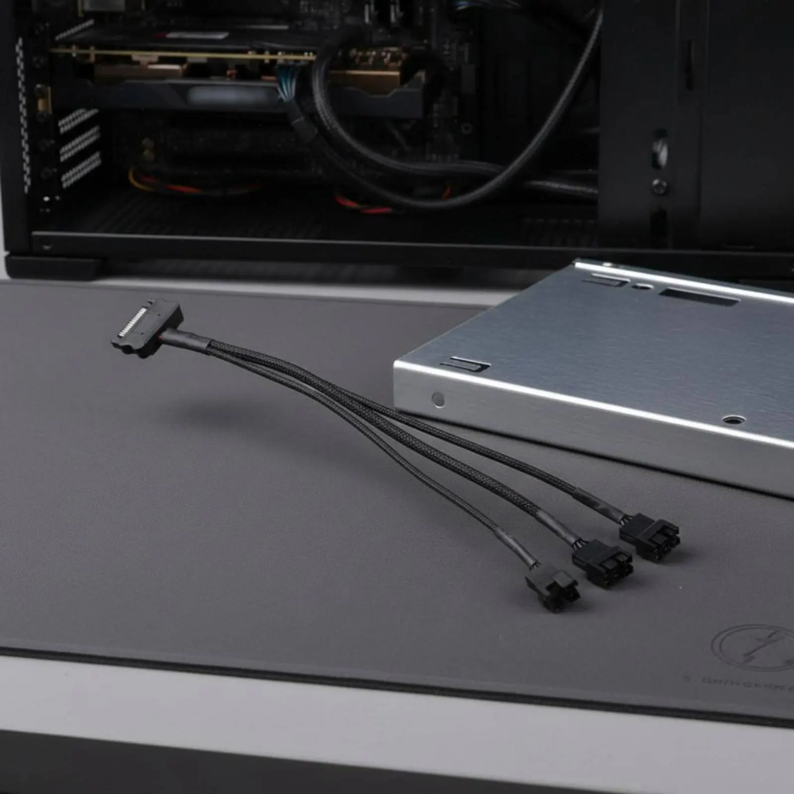 

1 to 3 Fan Power Splitter Cable Reduces Motherboard Load Serial ATA to 3 Fan