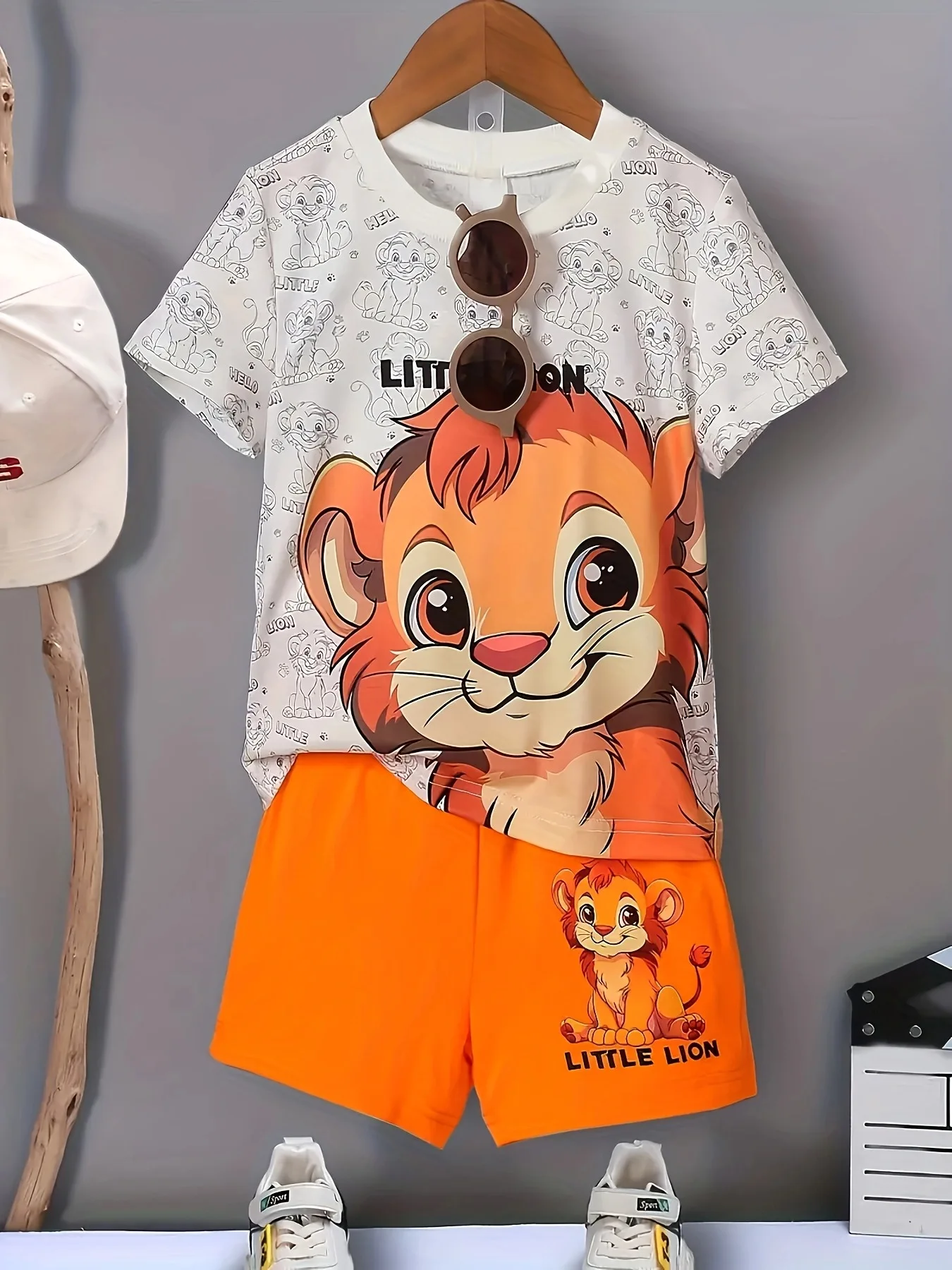 

Summer cartoon lion print short sleeved shirt and shorts set for infants, young children, boys, and babies