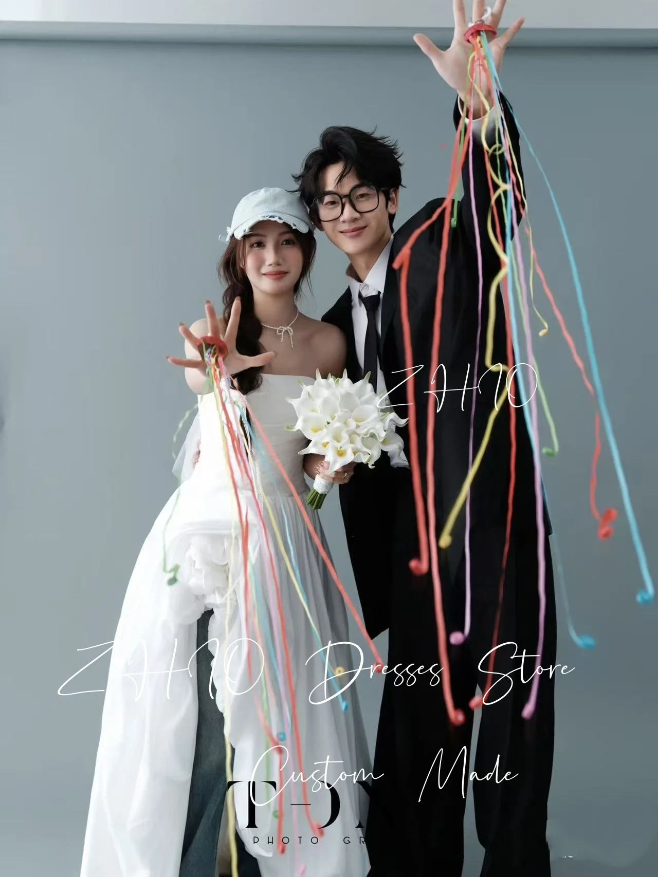 Sukienka ślubna ZHIO, nowoczesna, biała, bez ramiączek, linia A, plisy, tafta, koreańska sesja zdjęciowa, suknia na przyjęcie weselne, prosta, szyta na miarę.