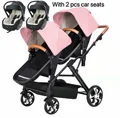 pink and 2 car seat