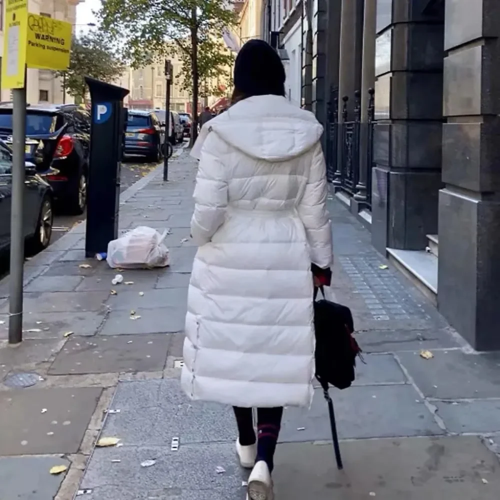 2025年新作 冬 レディース ロング丈 フード付き 暖かい ベルト付き スリム ダウンコート ホワイトダックダウンジャケット 女性 韓国風 オフィスレディー カジュアル ファッション