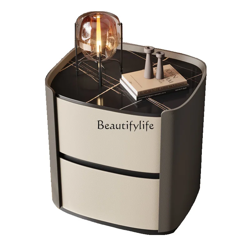 

Italian minimalist oval bedside table modern minimalist light luxury bedroom high-end bedside table