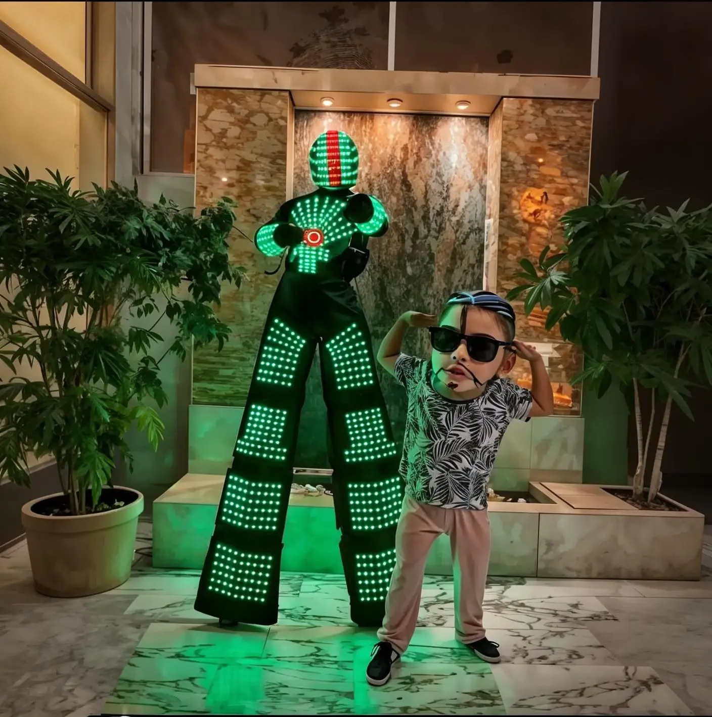 

Remote Control LED Robot Stilts Suit RGB Color Changing Dancing Costume with Helmet for Stage Shows Halloween Music Sync