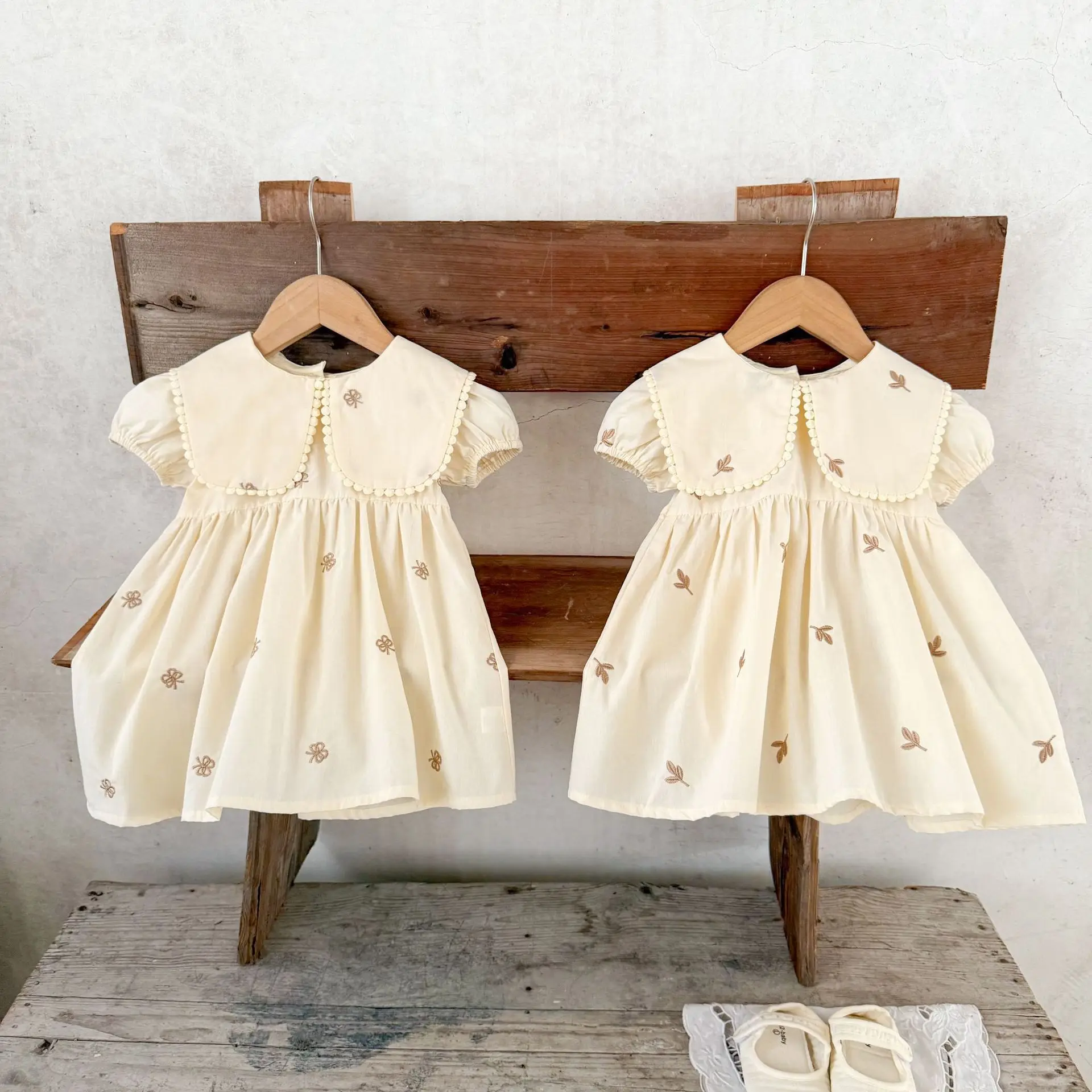 

Ins Korean Version Girls' Pure Cotton Cartoon Embroidered Lapel Short Sleeved Dress Versatile Cute Dress for Children in Summer