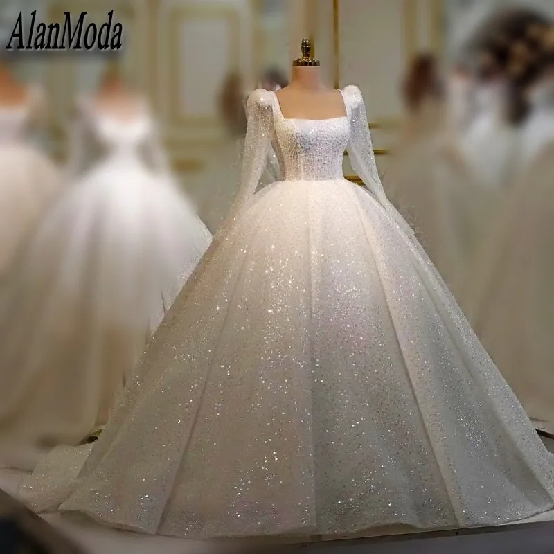 

Sparkly Arabic Dubai Wedding Dresses Winter Strapless Princess Sequin Bridal Gowns Long Sleeve Luxury Bata Novia Personalizada