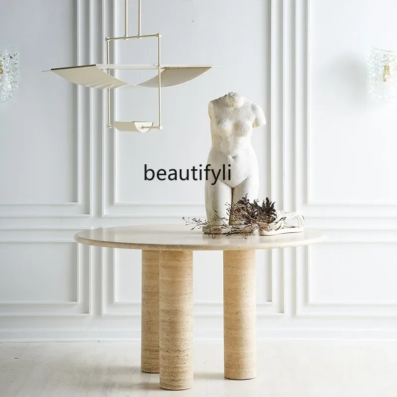 

Natural travertine round dining table medieval dining table marble designer light luxury dining table5556