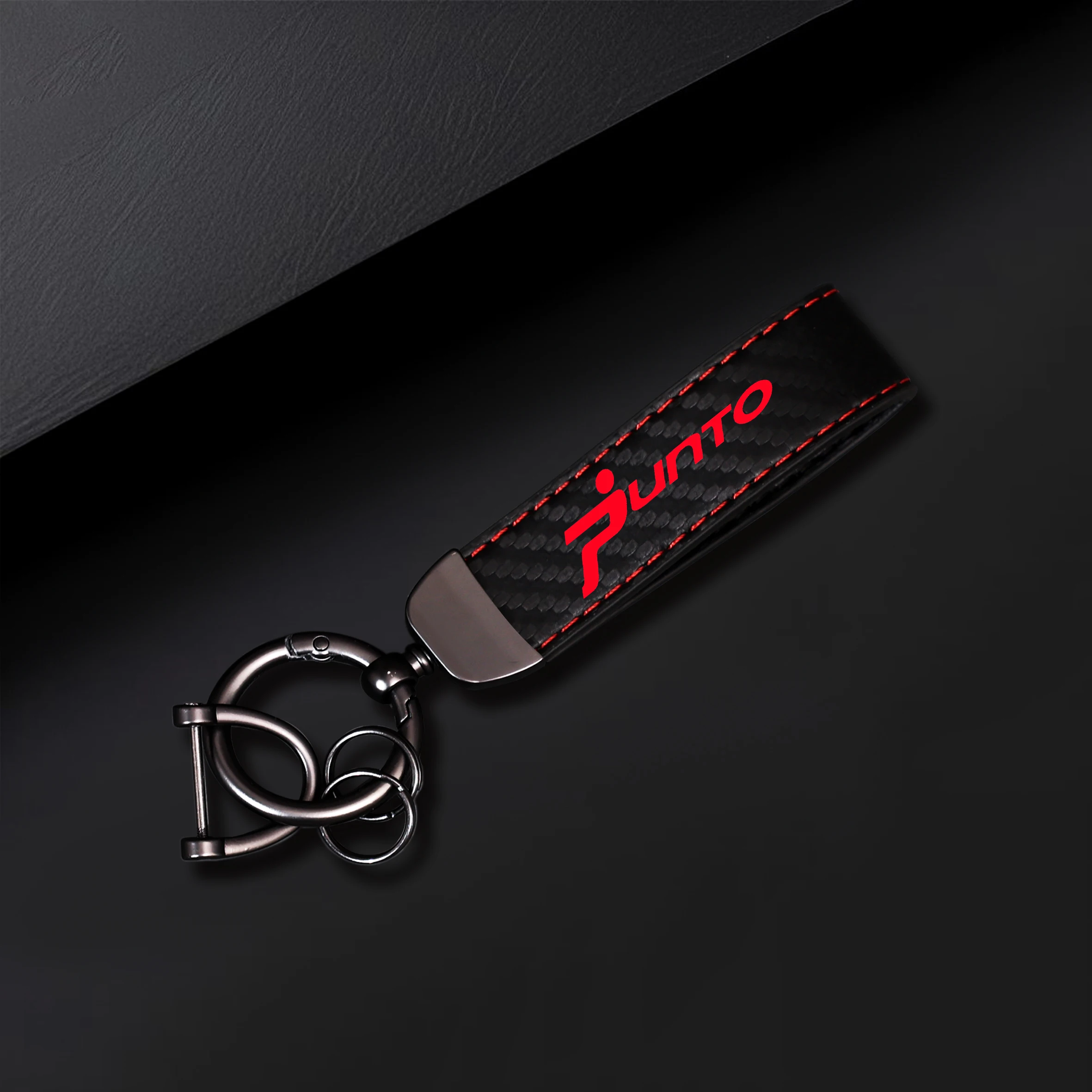 Llavero para coche Punto, moderno y clásico, hecho de materiales duraderos, adecuado para el desplazamiento diario.