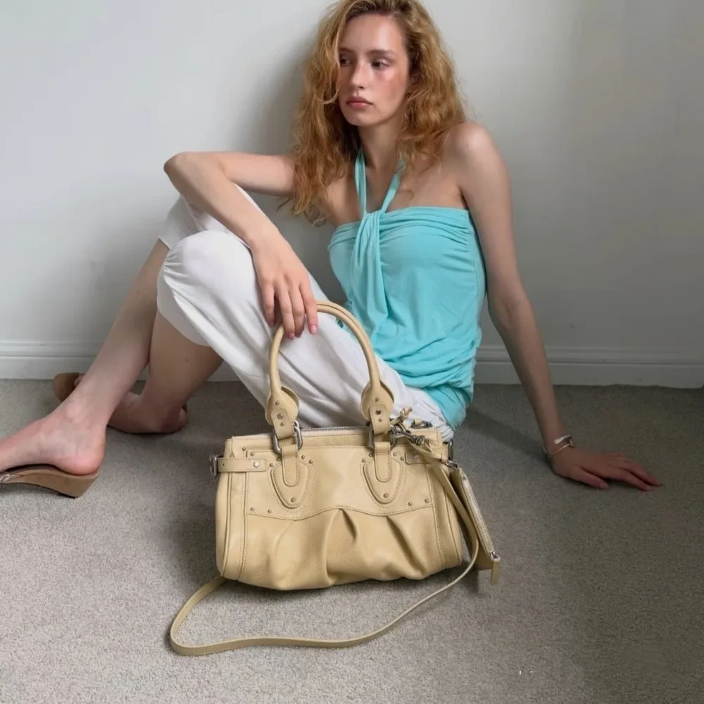 

2026 Summer New Women's Bag Retro Locomotive Style Shoulder Bag Underarm Texture Unique Fashion Simple Portable Messenger