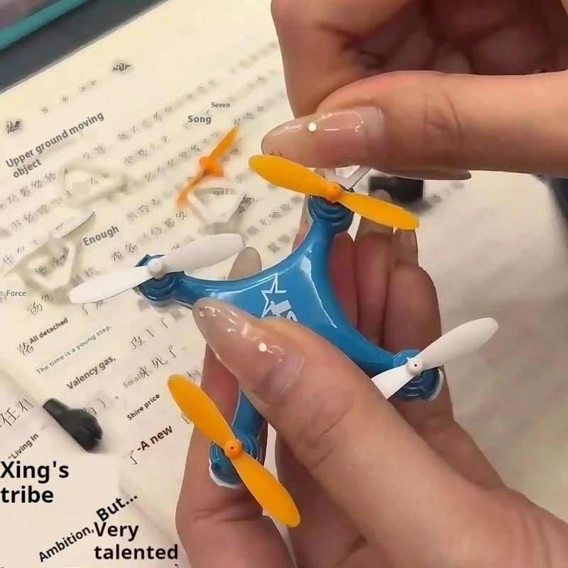 Hc702 Mini aereo di stoccaggio pieghevole Mini drone Aereo controllato da emozione Giocattolo per bambini Mini aereo Quadcopter ad altezza fissa