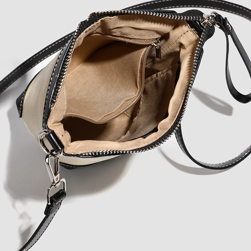 2025 New Summer Women's PU Leather Canvas Cut Bag Designer Luxury Niche Soft Polyester Indoor Zipper Pocket Leather Crossbody Ba