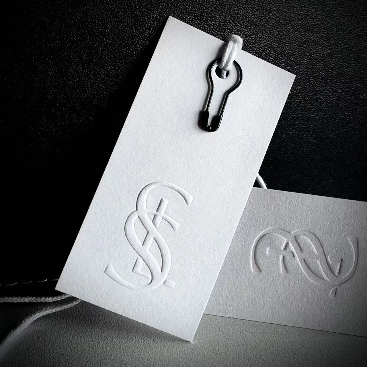

Custom Embossed Logo Hang Tags, High-end Clothing Brand Price Tags, Personalized Paper Labels for Clothing Bags Shoes