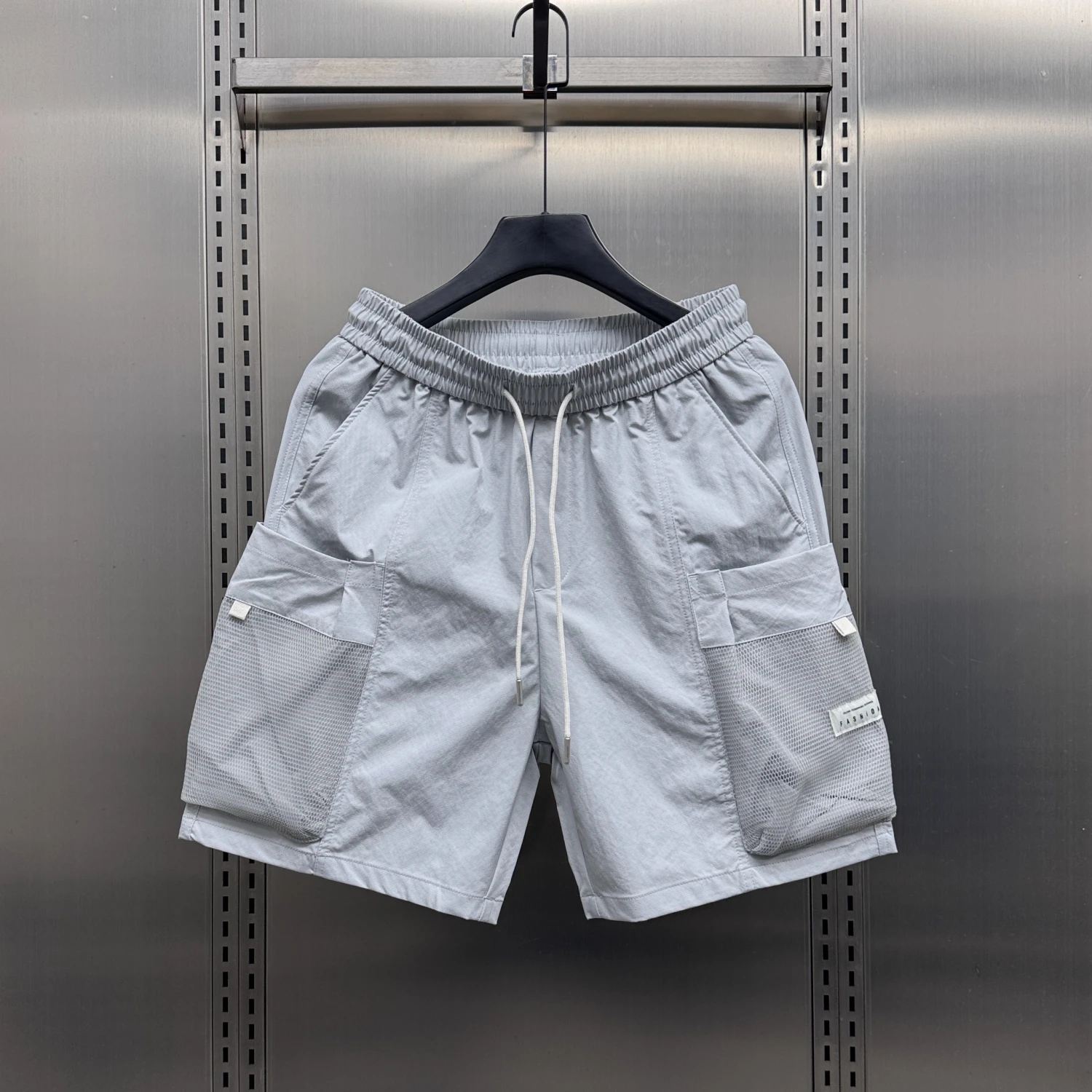 

Мужские летние повседневные брюки свободного кроя в американском рабочем стиле, трендовые, с эластичным поясом, большими карманами, для молодежи, коллекция 2025 года