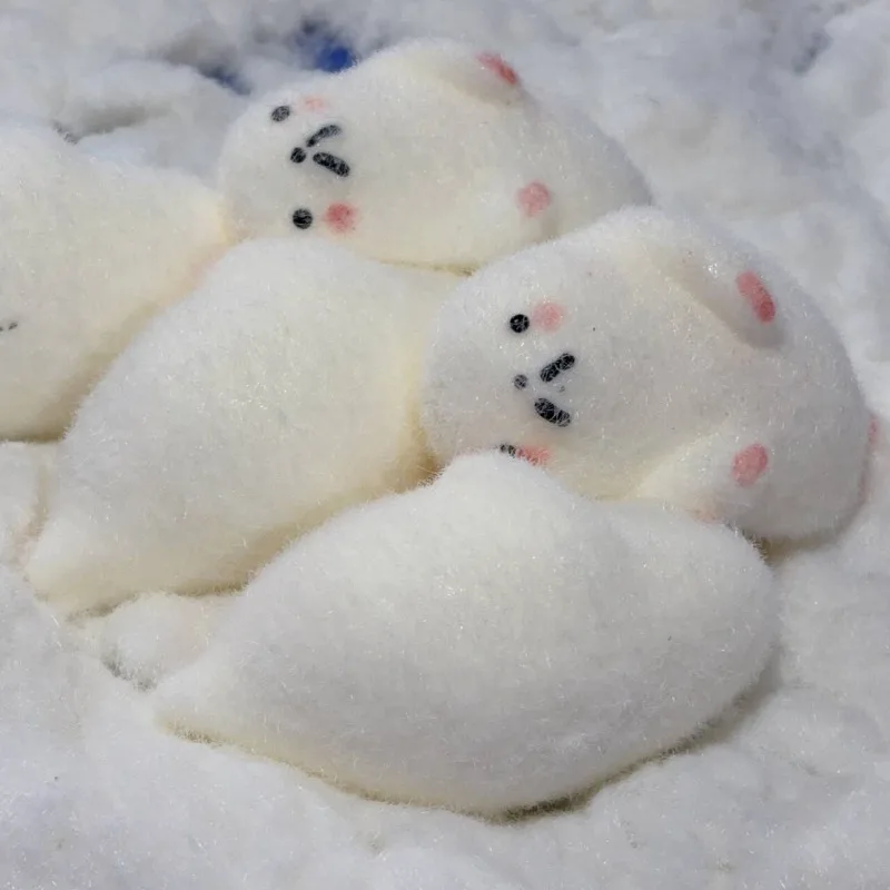 Adorable jouet à presser avec sceau, parfait comme cadeau pour les fêtes et les vacances pour adultes et enfants.