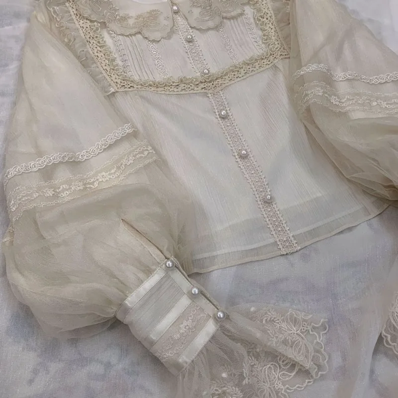 Japanese Style Fresh and Sweet Lolita Summer New Patchwork Doll Neck Button Lace Embroidery Solid Bandage Long Sleeved Shirts