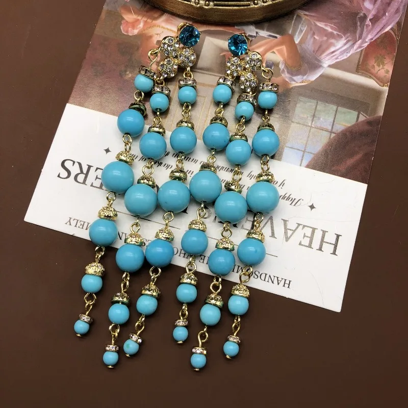 

Bohemian Long Earrings Women's Fashion Exaggerated Round Fringed Earrings Turquoise Temperament Fashion