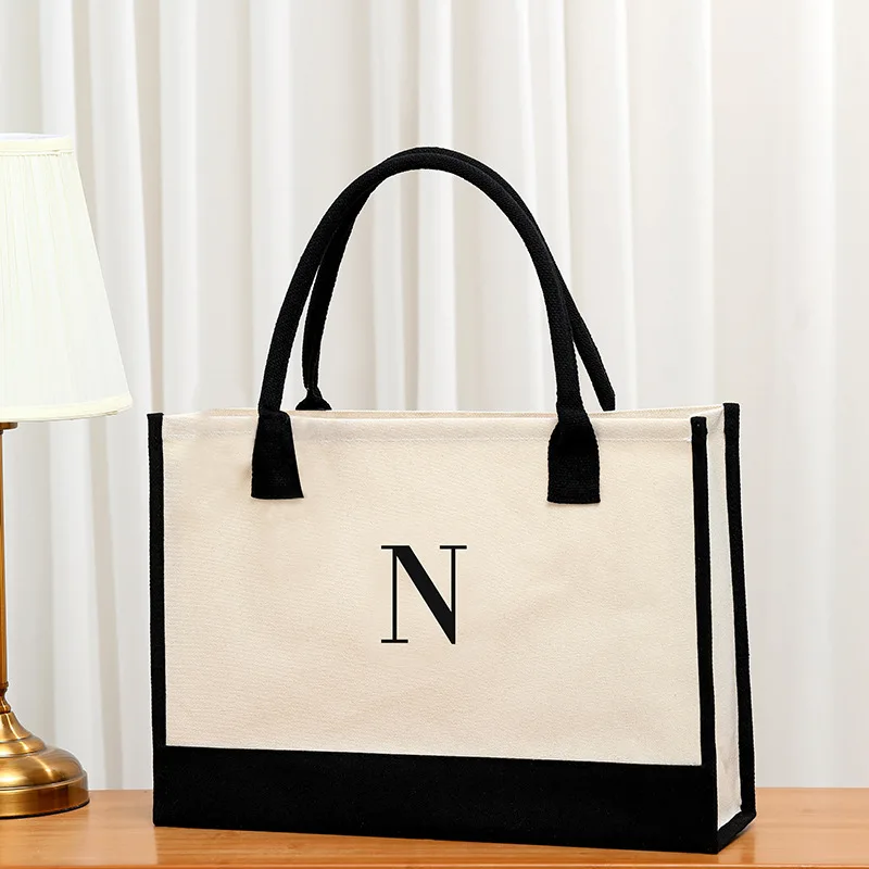 

Simple and large capacity new men's handbag pure letter design canvas hand storage bag daily work commuting bag