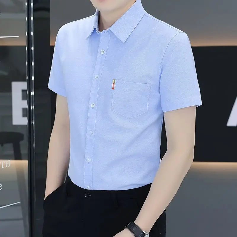 

Men's Light Blue Short Sleeve Slim Fit Dress Shirt With Pocket Detail Wrinkle Free Formal Business Casual Top