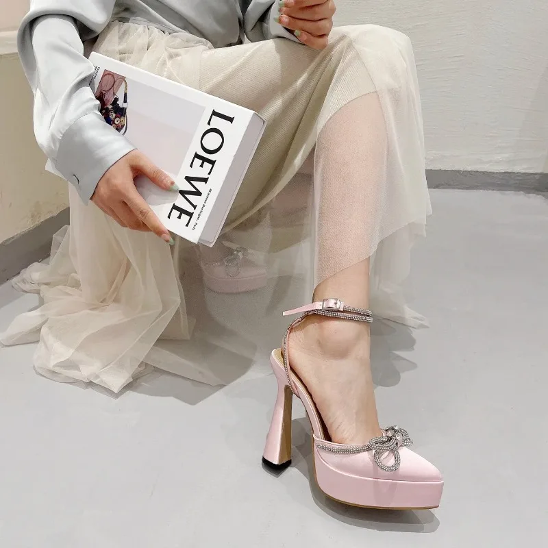 

2026 Hot Selling Fashion Bowknot Party Pumps Pointed Toe Sexy Platform Women Shoes Crystal Buckle Strap High Heels Prom Sandals
