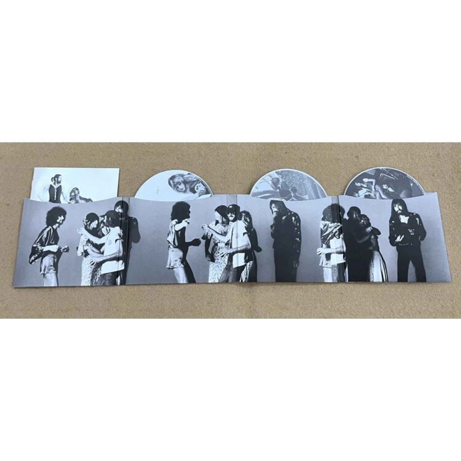 Rock Music CD Album with Retro Black-and-White Couple Silhouette Cover Elegant Design & Classic Tracks Creating A Nostalgic Vibe view 3