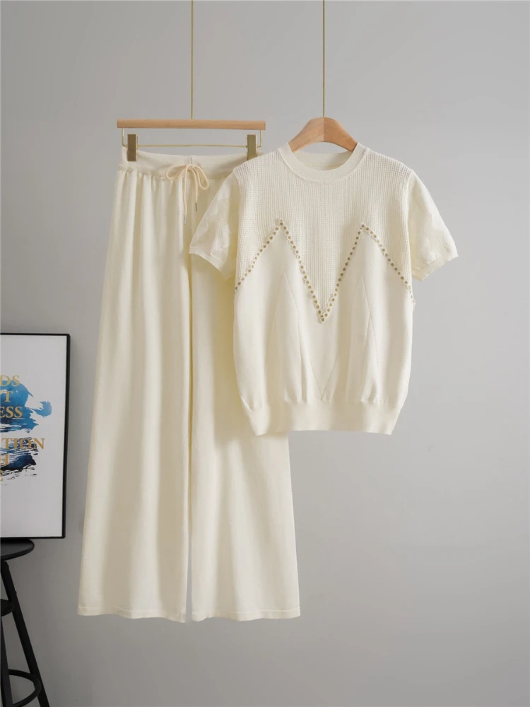 

European style foreign trade 2025 summer new women's slimming design hollow out top fashion wide leg pants two-piece set