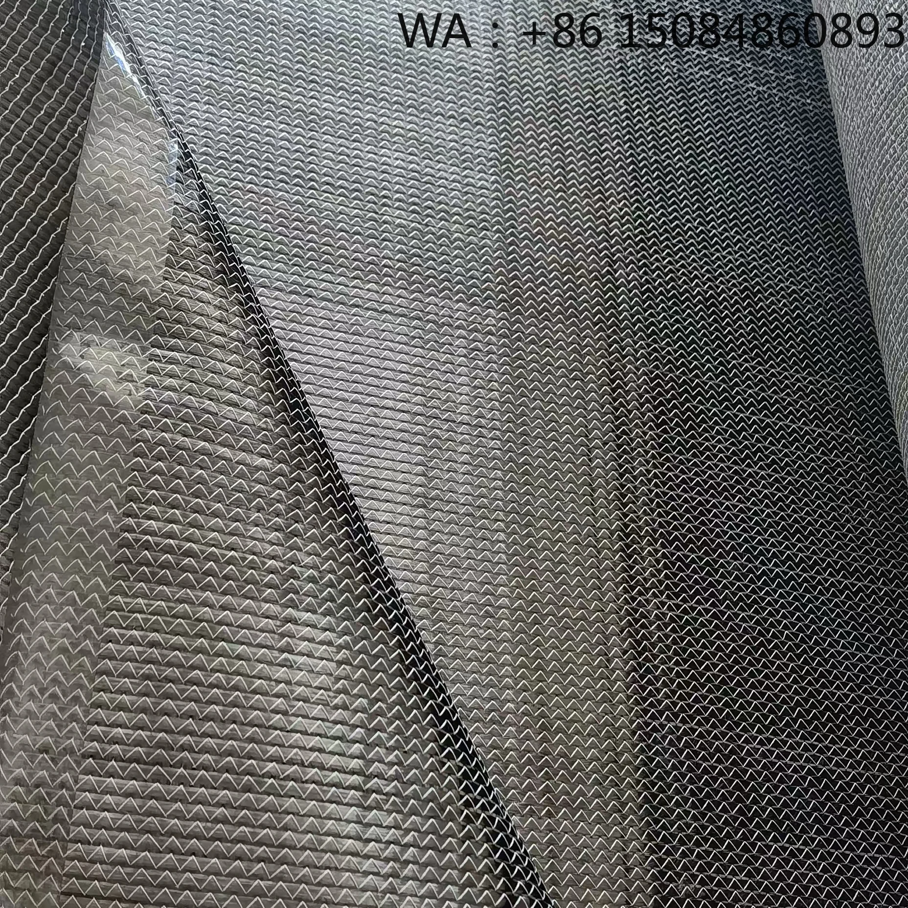 Tela de fibra de carbono y aramida hexagonal compuesta, material tejido con patrón único para decoración artesanal e industrial.