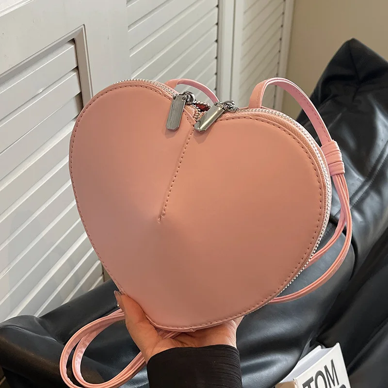 

2025 new high-end texture niche single shoulder crossbody bag peach heart bag