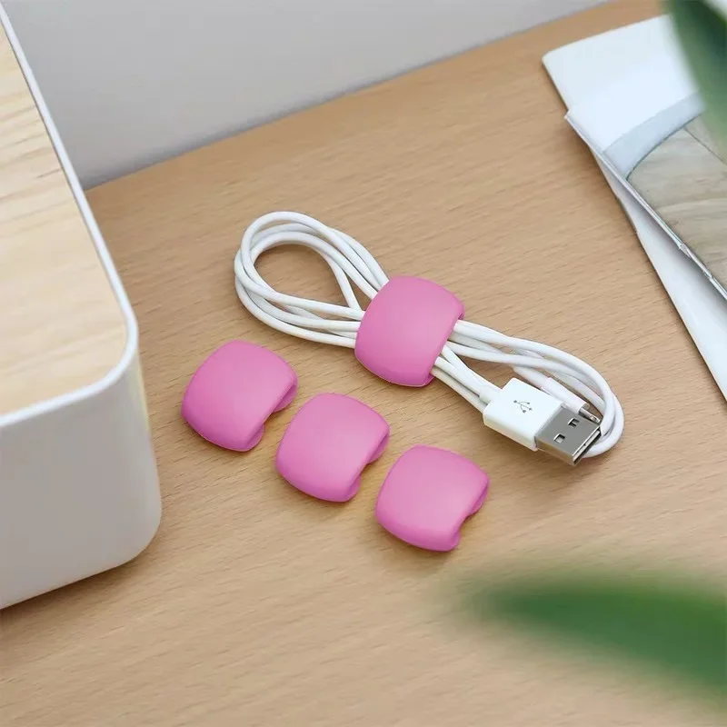 1ชิ้นม้วนสายเคเบิลแฟชั่นแบบเรียบง่ายคลิปกลม USB แท่นชาร์จโทรศัพท์โต๊ะจัดระเบียบสายไฟสำหรับสายบนโต๊ะคงที่