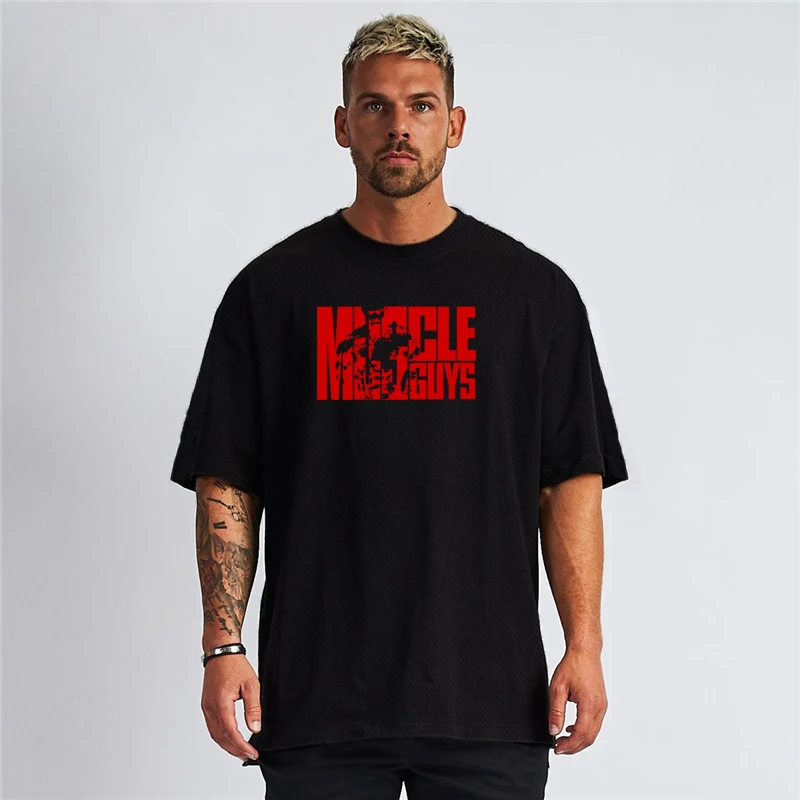 

Muscleguys Running T-Shirts Mens Oversized Loose Drop Shoulders Gym Clothing Fitness T-shirt Quick Dry Mesh Sport Tees