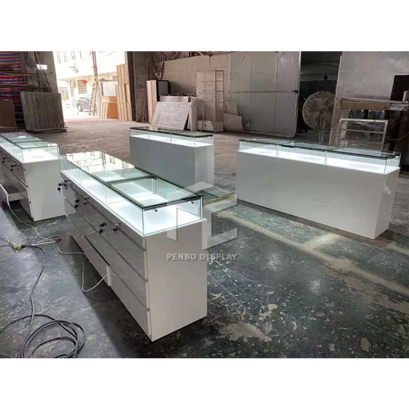 

2025customized. luxury jewellery shop showcase design stainless steel jewellery counter design custom glass jewelry display tabl