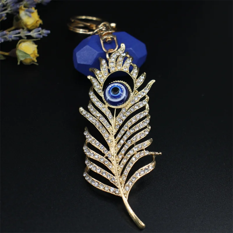 

Bohemia Evil Eye Hamsa Hand Keychain For Women Men Blue Eye Feather Key Ring Bag Pendant Car Key Holder Rings Wholesale